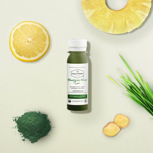 wheatgrass wellness shot elixir made with pineapple lemon ginger wheatgrass spirulina