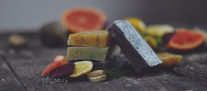 Stacks of natural, colourful soaps.