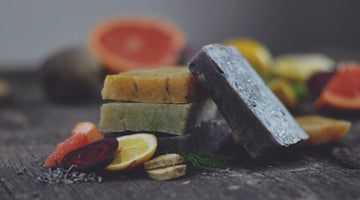 Stacks of natural, colourful soaps.