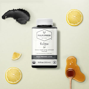 eclipse cold pressed juice made with lemon maple syrup activated charcoal 