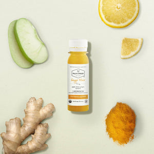 ginger wellness shot elixir made with apple lemon ginger turmeric