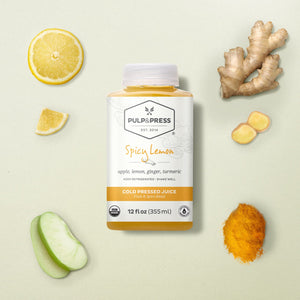spicy lemon cold pressed juice made with apple lemon ginger turmeric